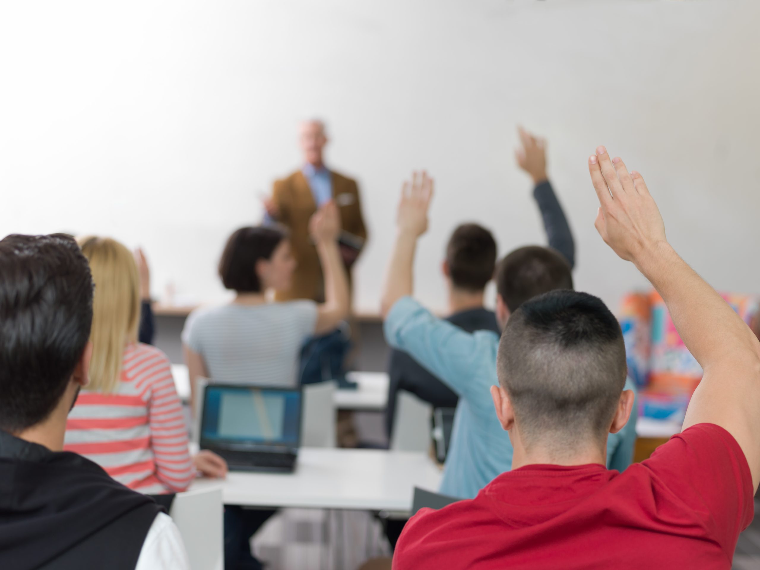 senior teacher teaching lessons, smart students group raise hands up in school  classroom on class